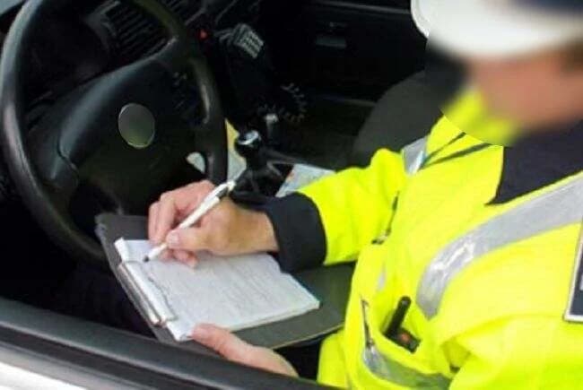 Polițist din Oradea, condamnat după ce și-a amendat vecina și i-a falsificat semnătura