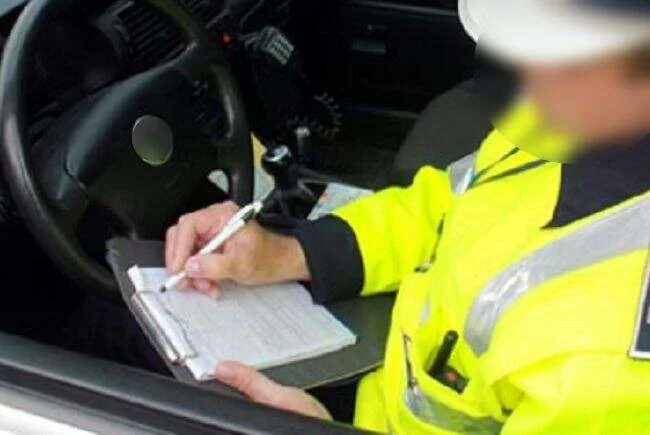 Polițist din Oradea, condamnat după ce și-a amendat vecina și i-a falsificat semnătura